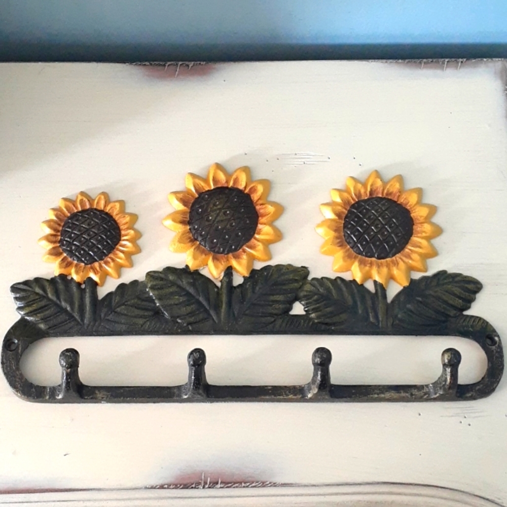 ^ Vintage Cast Iron Sunflower key holder storage hooks